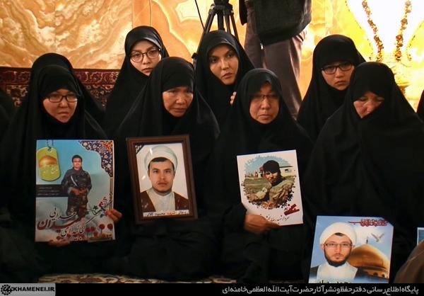 Mothers of Fatamayoun Militiamen Hold Photos of Sons Killed in Action, 2017.