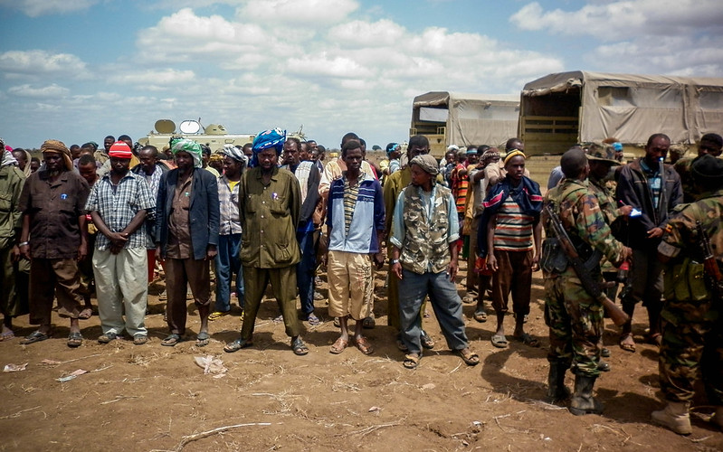 Members of the Al Qaeda-affiliated militant group Al-Shabaab stand after giving themselves up to forces of the African Union Mission in Somalia (AMISOM) in September 2012.