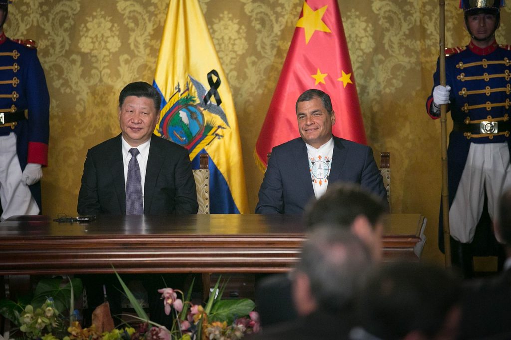 Chinese President Xi Jinping and former Ecuadorian President Rafael Correa sign 11 cooperative agreements during a state visit in 2017.