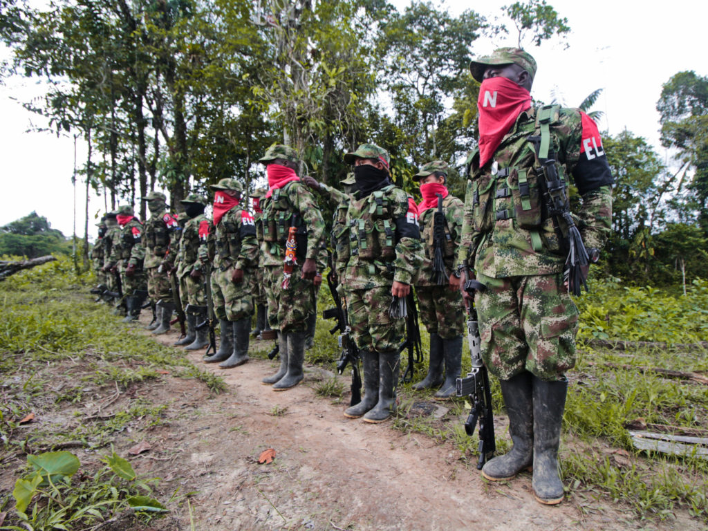 Members of Colombia’s ELN stand at attention.