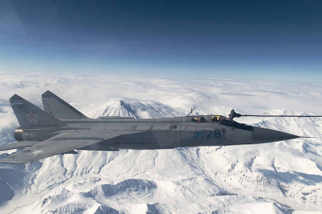 In Kamchatka, MiG-31 [RG1] fighters of the Pacific Fleet worked out the interception of a mock enemy cruise missile (Author’s note: In spite of the Russian description, the MiG-31 looks to be air-to-air refueling).